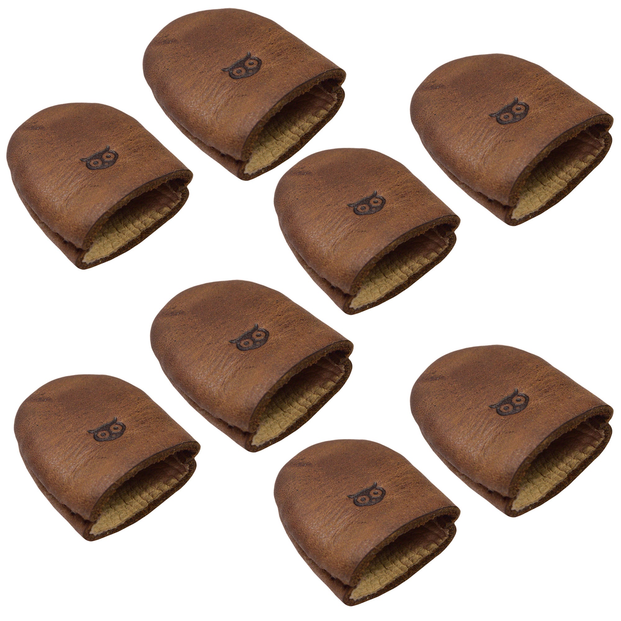 Leather Thimble by Hide & Drink, presenting a Set of 8 Thimbles that serve as Finger Protectors for a variety of sewing projects such as Hand Applique & EPP and Quilting Embroidery. Made from Full Grain Leather, these Hand Cut and Hand Sewn artisan products are Fire Branded and represent Small Batch Production, handmade in La Antigua Guatemala & Oaxaca Mexico.