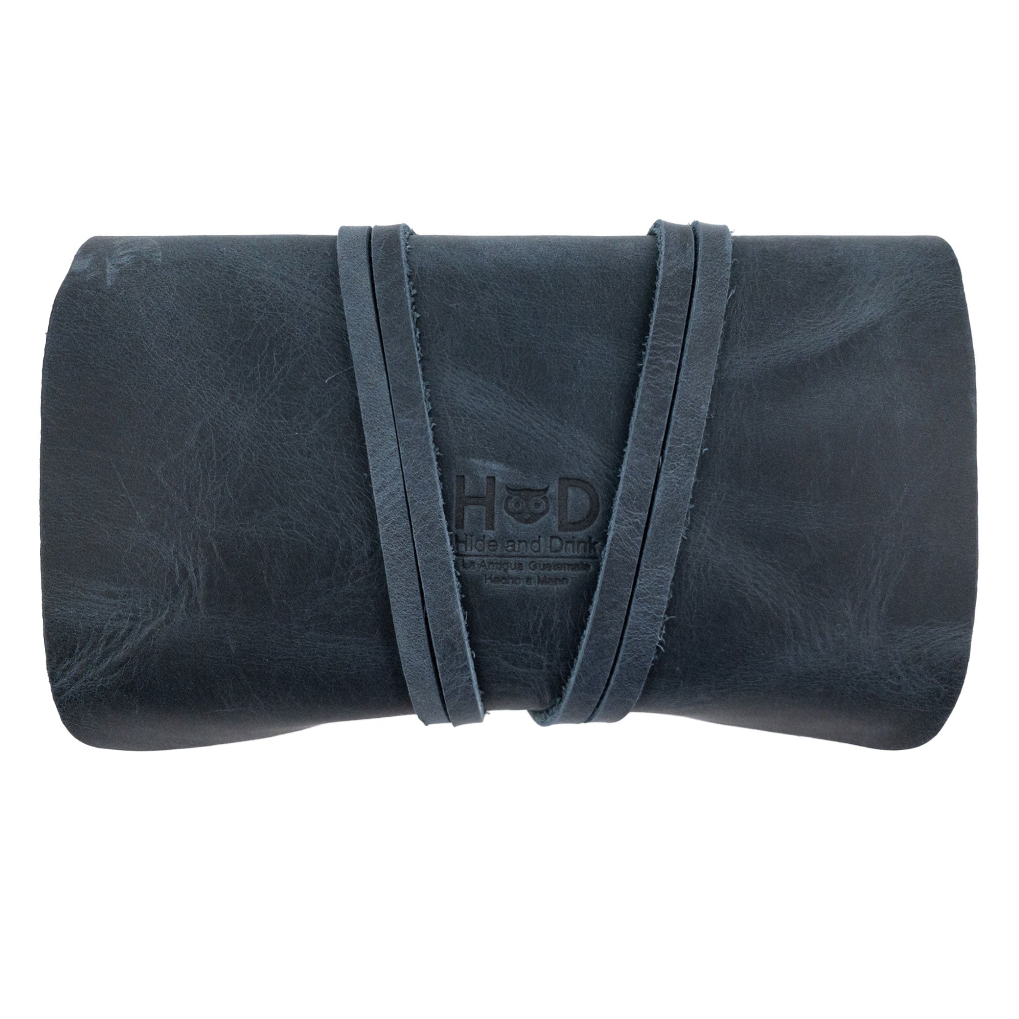 Hide & Drink's King Size Tobacco Pouch, neatly closed, showcasing its durable leather craftsmanship, ideal for tidy tobacco and field note storage while reflecting small batch production heritage.