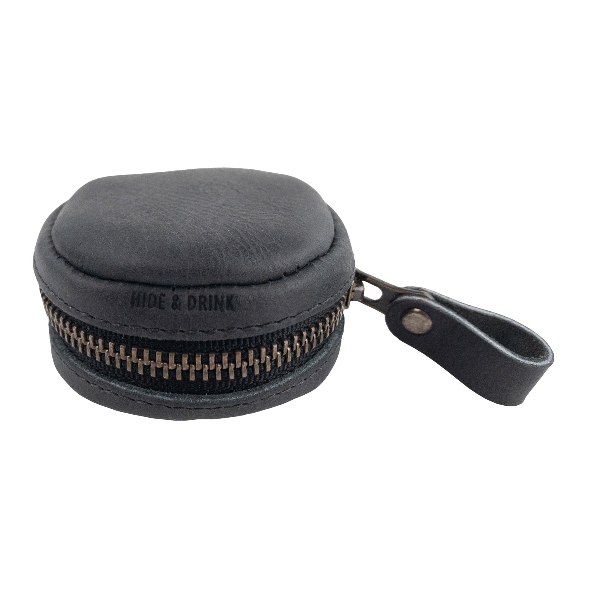 Hide & Drink Rounded Coin Case in black leather, featuring a sleek look, crafted from Full Grain Leather. This artisan product reflects small batch production with hand cut and hand sewn qualities, fire branded by artisans from La Antigua Guatemala & Oaxaca Mexico.