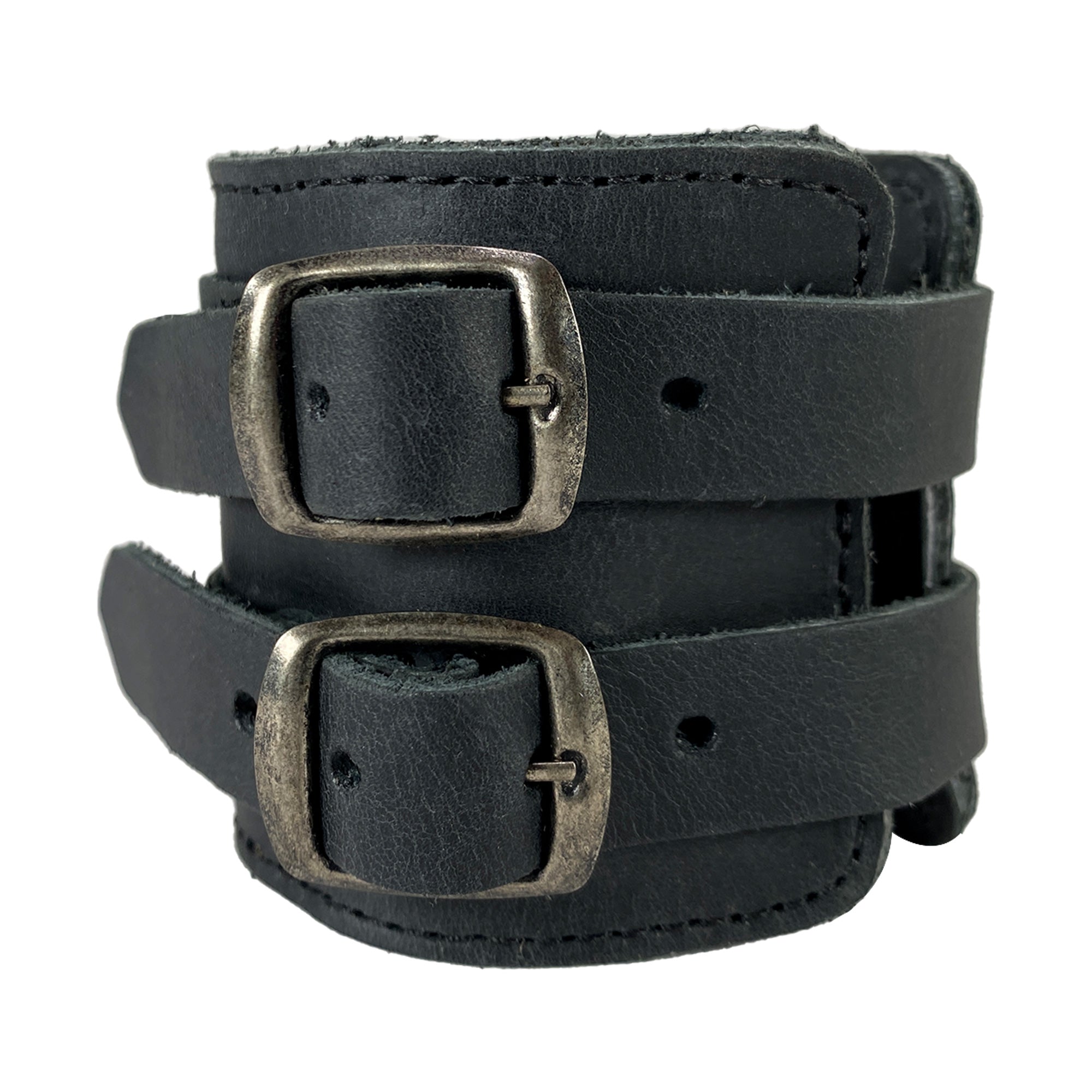 A stylish open view of Hide & Drink's Wrist-Wallet-Cuff demonstrating its practical hidden pouch for bills. Crafted from Full Grain Leather, this rustic leather bracelet features an inner zippered pouch. Handmade in La Antigua Guatemala & Oaxaca Mexico, it combines craftsmanship with modern functionality, perfect for daily wear.