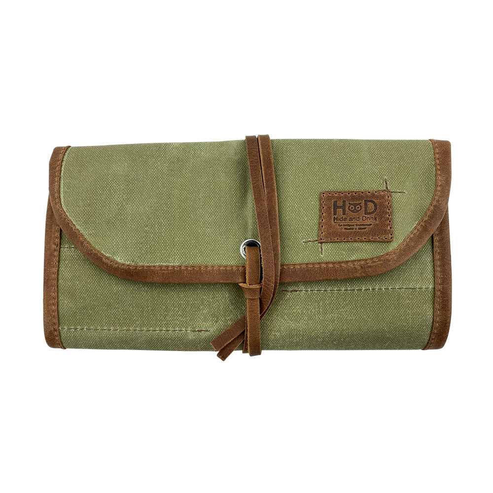 Hide & Drink Tool Roll showcases a chic small tool roll-up bag with 10 slots, made from robust full grain leather. Ideal for a portable carry-on pouch that organizes woodworking tools, this bag enhances your workshop storage solutions. Handcrafted in La Antigua Guatemala & Oaxaca Mexico, ensuring artisanal quality.