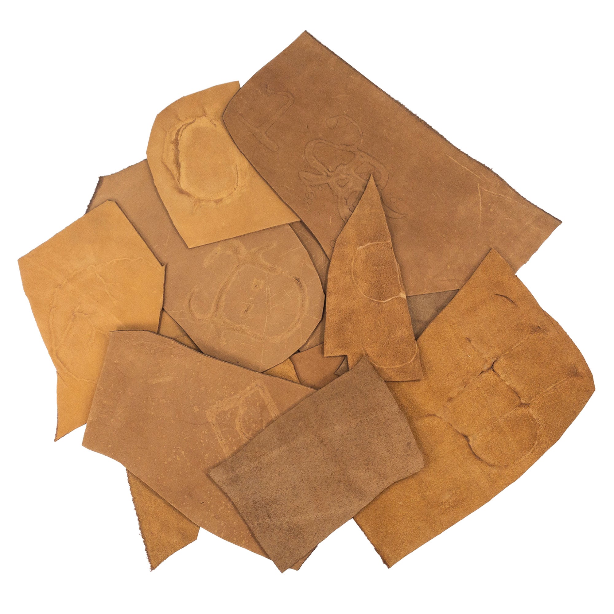 Hide & Drink Leather Scraps With Scars (12 oz pack) showing a unique collection of full grain leather scraps perfect for arts & crafts. Each handcrafted piece showcases distinctive scars, measuring approximately 8 inches and available in various widths. Artisan-made in La Antigua Guatemala to enhance your crafting experience.