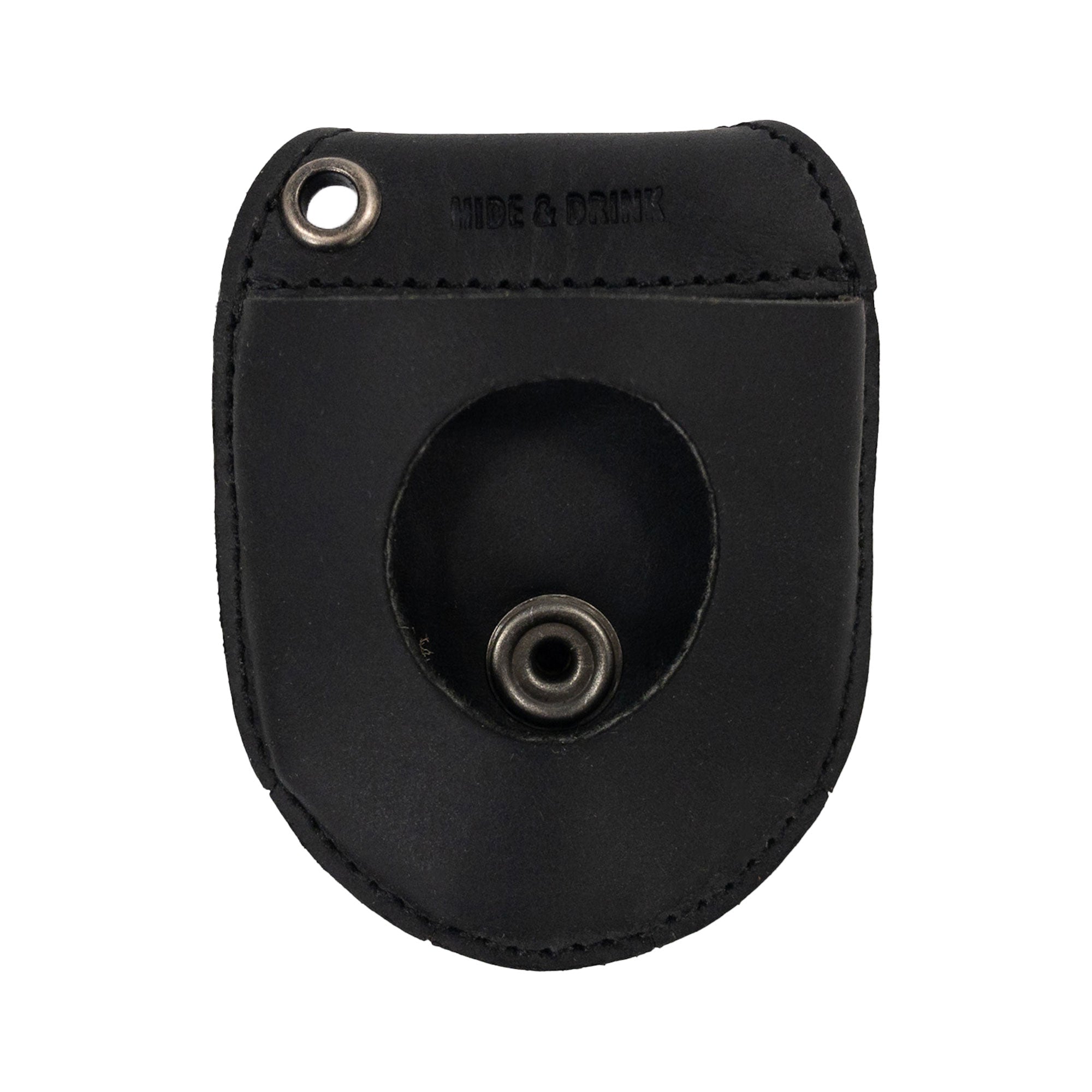 Back view of Hide & Drink Pocket Watch Holder and Case in black leather, revealing its durable build designed for timepiece security. This pocket watch case is a rustic protector holder made from full grain leather, illustrating hand cut and hand sewn craftsmanship, part of artisan small batch production in La Antigua Guatemala & Oaxaca Mexico.