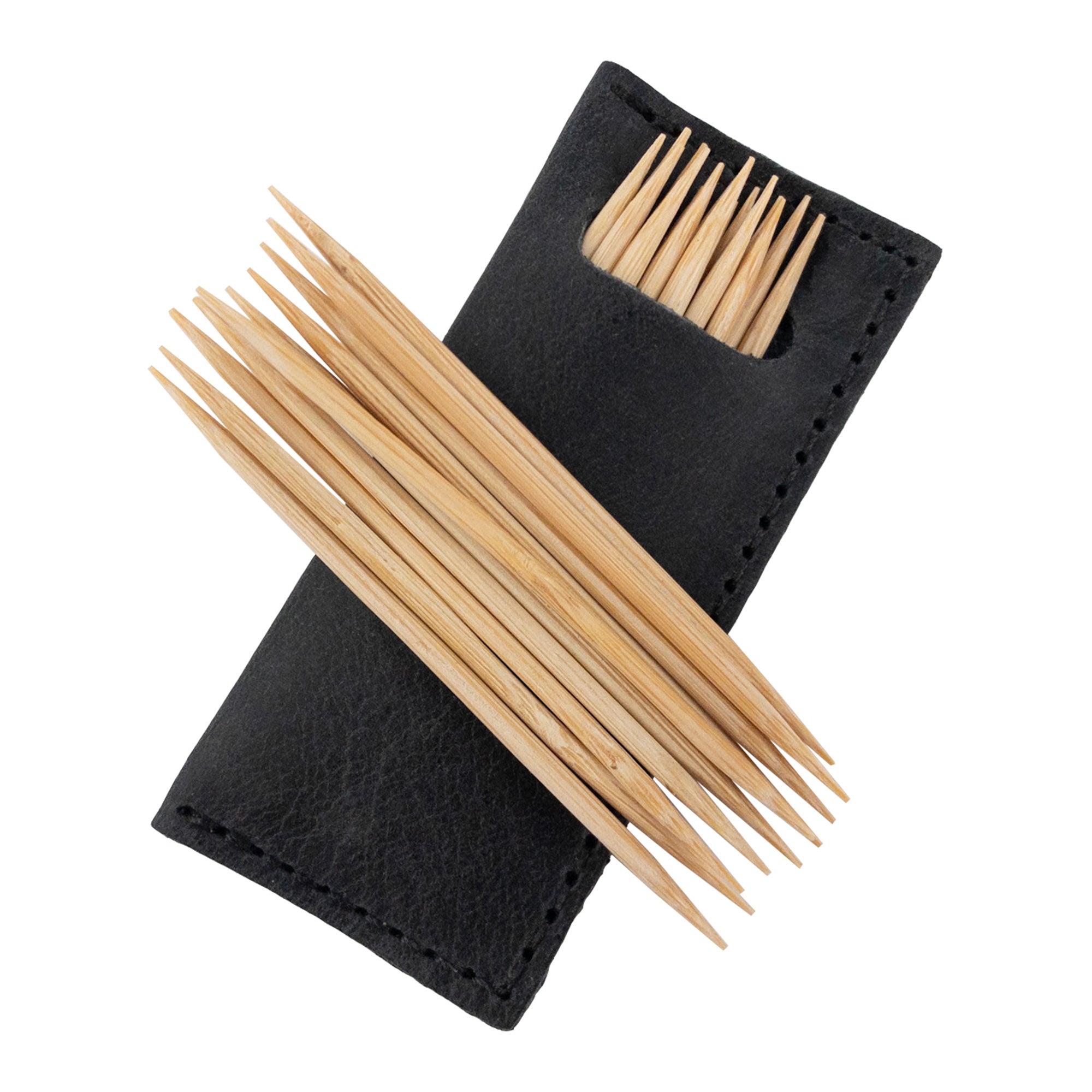 Hide & Drink Tooth Pick Case (4 Pack) presenting a dark leather holder for toothpicks with some inside. Set of 4 Tooth Pick Cases, Cooking Accessories, Full Grain Leather, StockyardX, Small Batch Production, Hand Cut, Hand Sewn, Fire Branded, Artisan, Handmade in La Antigua Guatemala & Oaxaca Mexico.