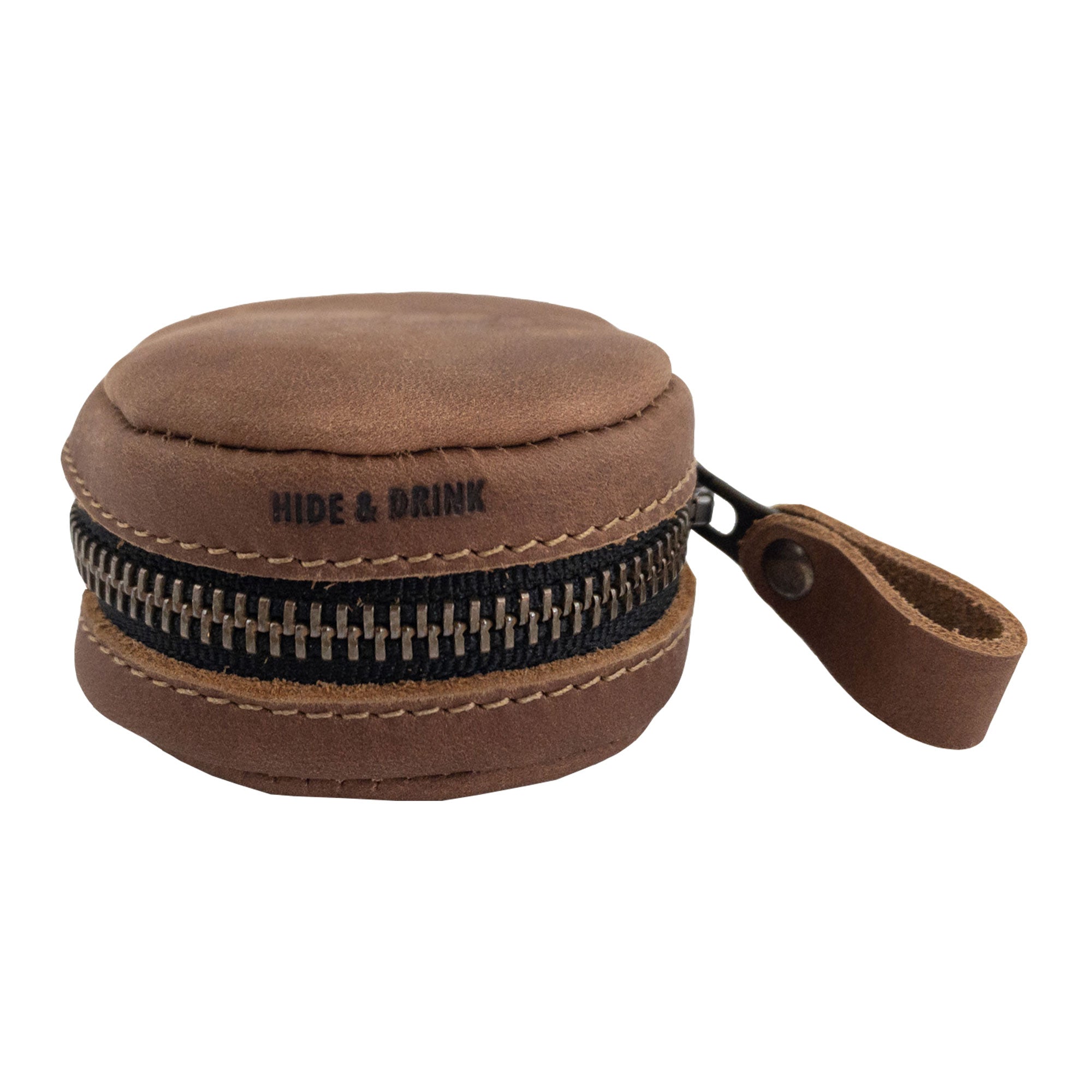 Hide & Drink Rounded Coin Case, open to show interior structure, crafted from Full Grain Leather. This artisan item exhibits quality through hand cut, hand sewn details, and fire branding, resulting from a commitment to small batch production in La Antigua Guatemala & Oaxaca Mexico.