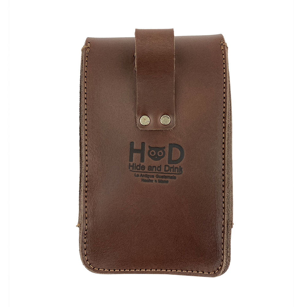 Brown Bartender Fanny Pack by Hide & Drink featuring a durable exterior with the brand logo. This stylish pouch is designed to carry items like a Bartender Bottle Opener and corkscrew holster, made from thick full grain leather. Handcrafted with care in La Antigua Guatemala.