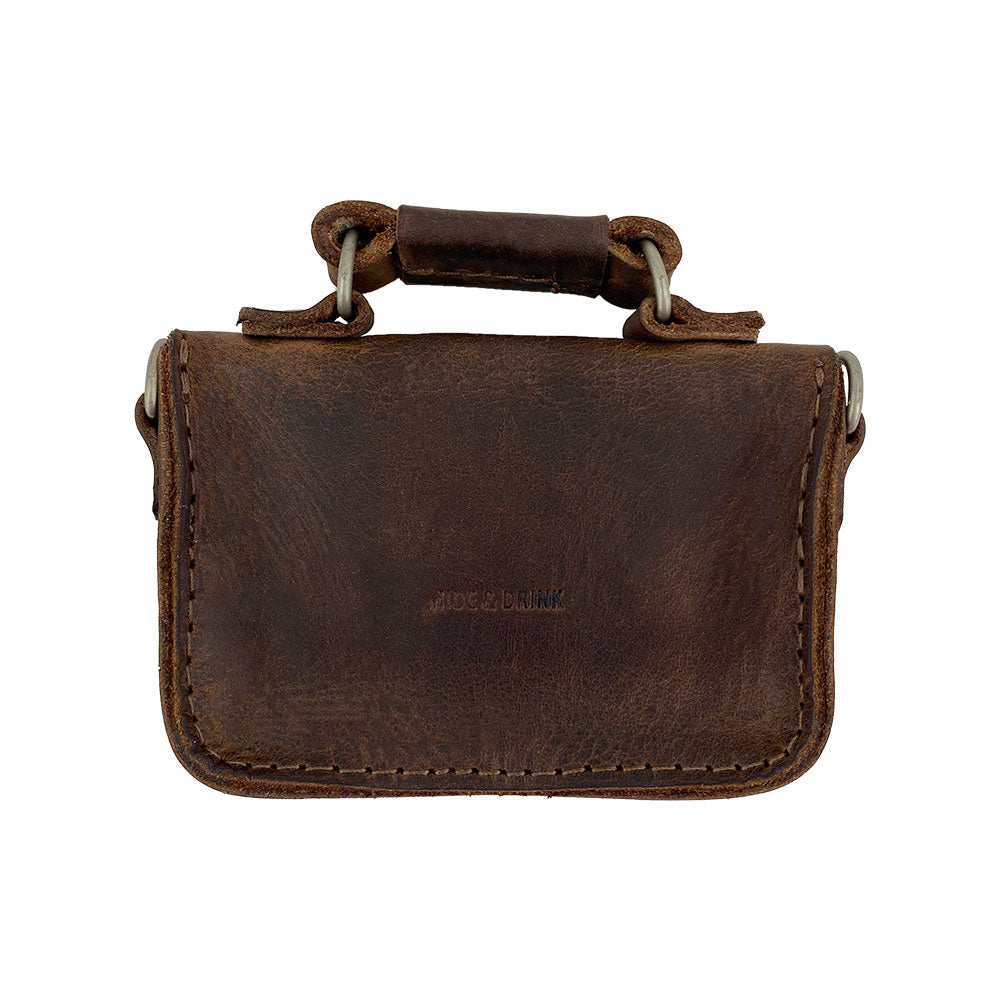 Hide & Drink's Card Holder Briefcase Style, showcasing the back of a Mini Briefcase Card Holder made of durable Full Grain Leather. Ideal for holding up to 10 cards and folded bills, emphasizing its role as a cash organizer crafted through small batch production and artisanal techniques.