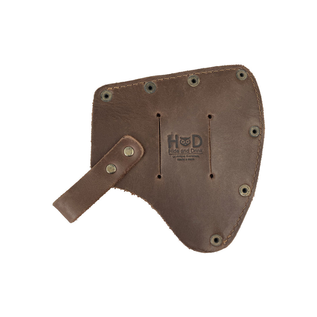 The reverse side of the Camper Axe Head Sheath by Hide & Drink, featuring a durable design of this Adjustable Axe Sheath. This protector case cover is made from Full Grain Leather, an essential blade sleeve within camping accessories, highlighting small batch artisan work. Hand cut and sewn, fire branded, and crafted in La Antigua Guatemala & Oaxaca Mexico.