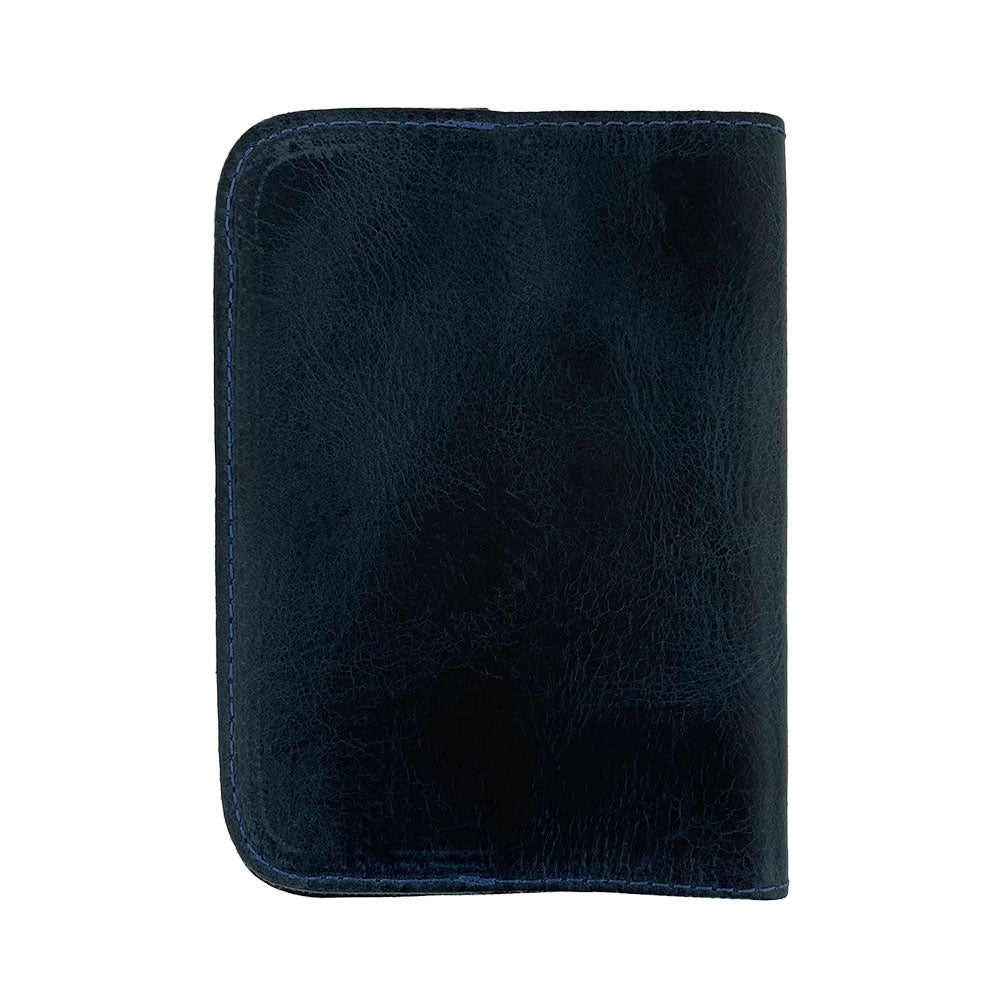 Inside view of the Hide & Drink Travel Wallet showcasing card slots and cash compartments. This travel wallet is perfect for organizing essentials, acting as a bifold passport case crafted in La Antigua Guatemala.