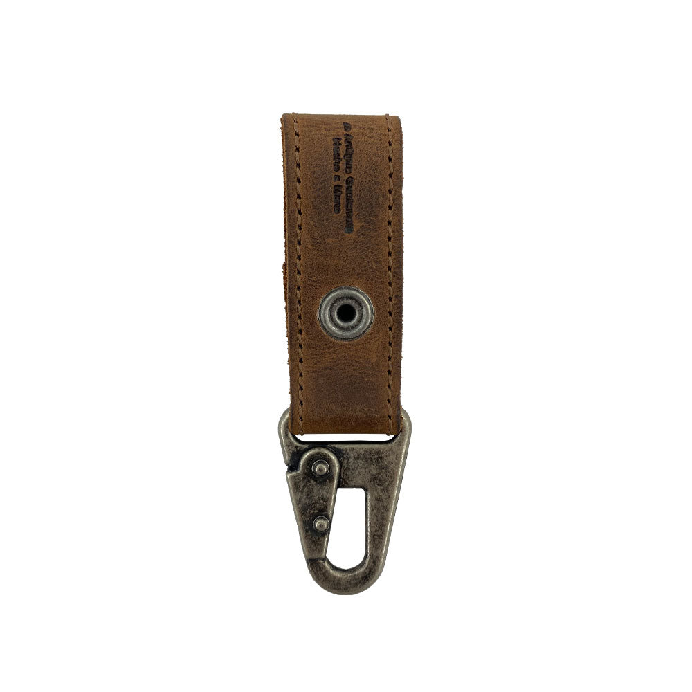 Back view of the Key Ring Holder by Hide & Drink, showcasing the durable Full Grain Leather and solid metal clip. This handmade artisan product highlights small batch production, hand cut and hand sewn details, fire branded design, made lovingly in La Antigua Guatemala & Oaxaca Mexico.