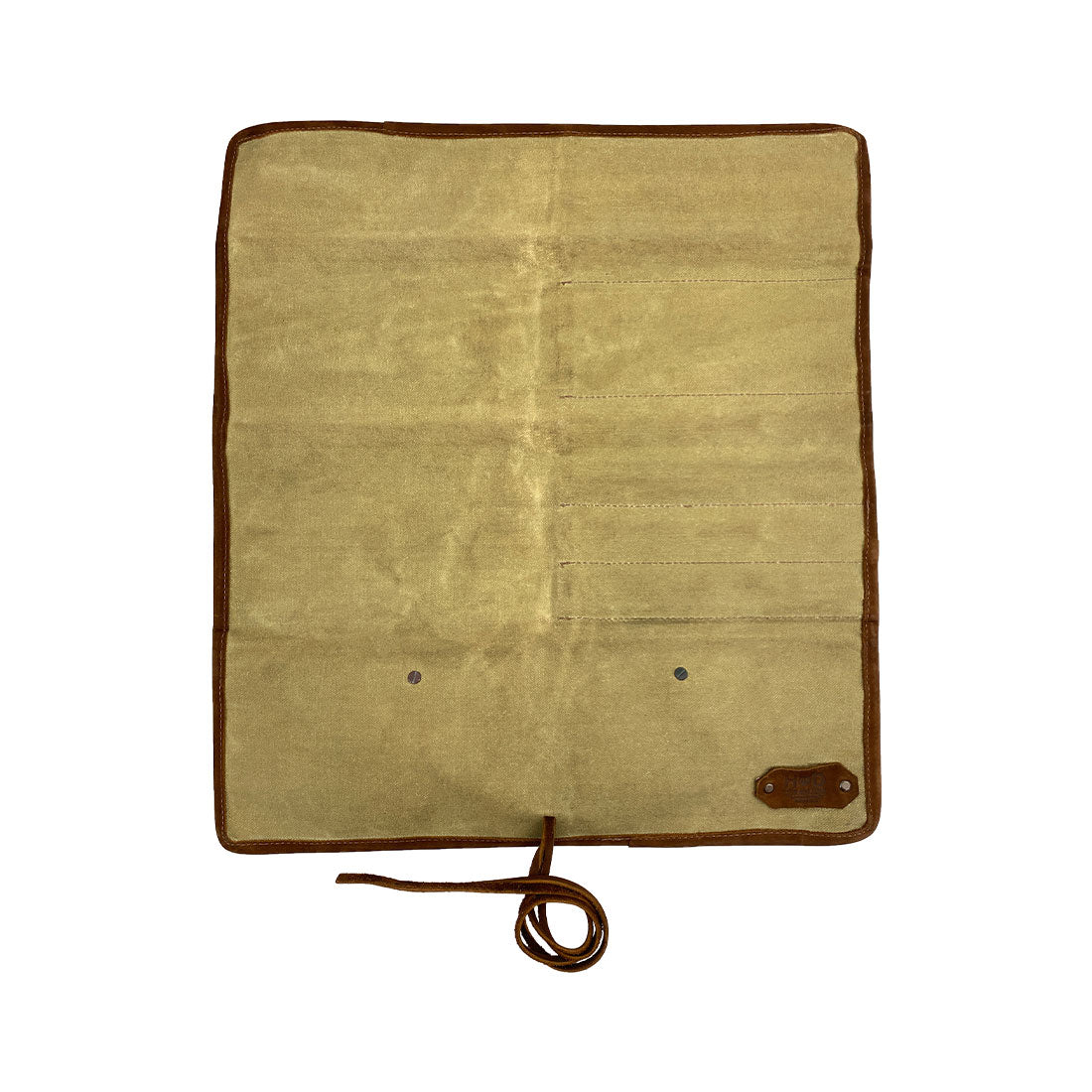 Hide & Drink Knife Roll (5 Pockets) displayed in detail, made from robust Full Grain Leather. This Chef Knife Bag serves as a portable carrying case for knives, highlighting craftsmanship through handmade quality from small batch production, which includes hand cut and hand sewn elements.