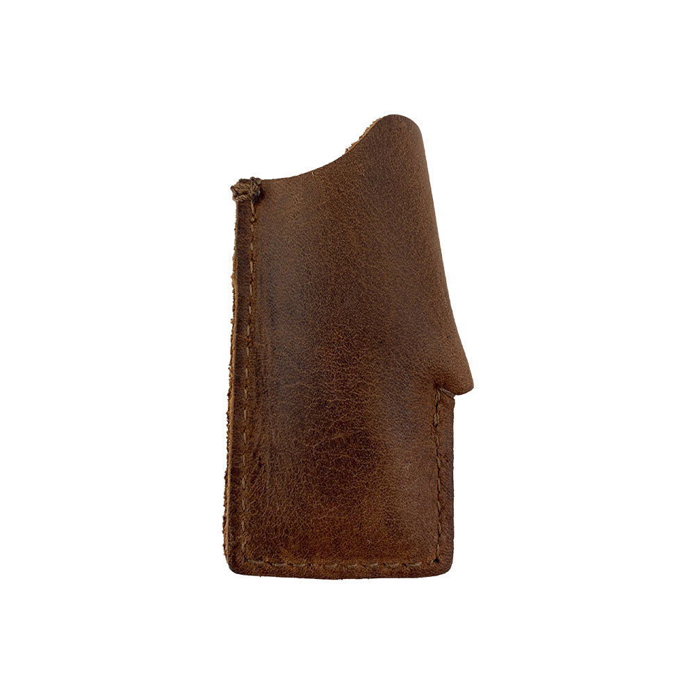Side view of the Hide & Drink Lighter Protective Case made from premium full grain leather, exemplifying elegant and durable design. This artisan piece is handmade in La Antigua Guatemala & Oaxaca Mexico. Keywords include: Lighter Protective Case, Full Grain Leather, StockyardX, Small Batch Production, Hand Cut.