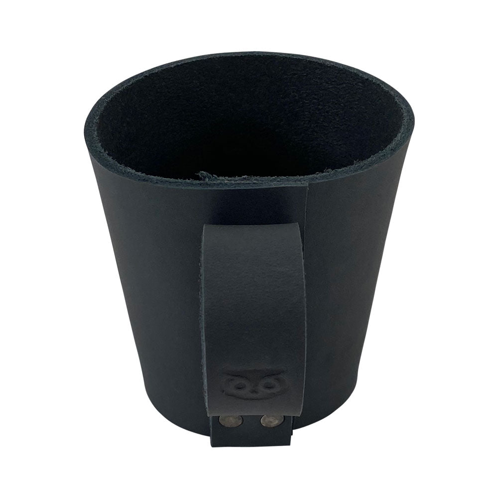 Versatile design of the Pint Sleeve with Handle by Hide & Drink, built for any drink. This handmade, Full Grain Leather piece exemplifies artisan craftsmanship through Small Batch Production, perfect for enhancing your bar visuals.