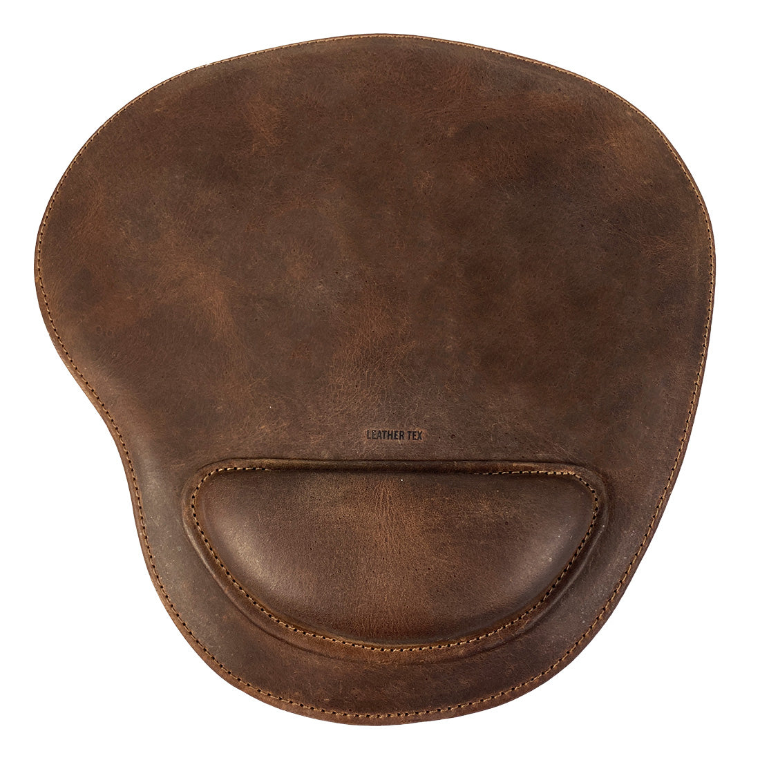 Top view of the LeatherTex Rustic Oval Shape Mousepad, featuring a rich brown color and a luxurious wrist rest. This mousepad offers anti-slip durability and is a great accessory for computers, laptops, and Macs in office settings. Handmade in La Antigua Guatemala & Oaxaca Mexico, showcasing skilled artisan techniques.