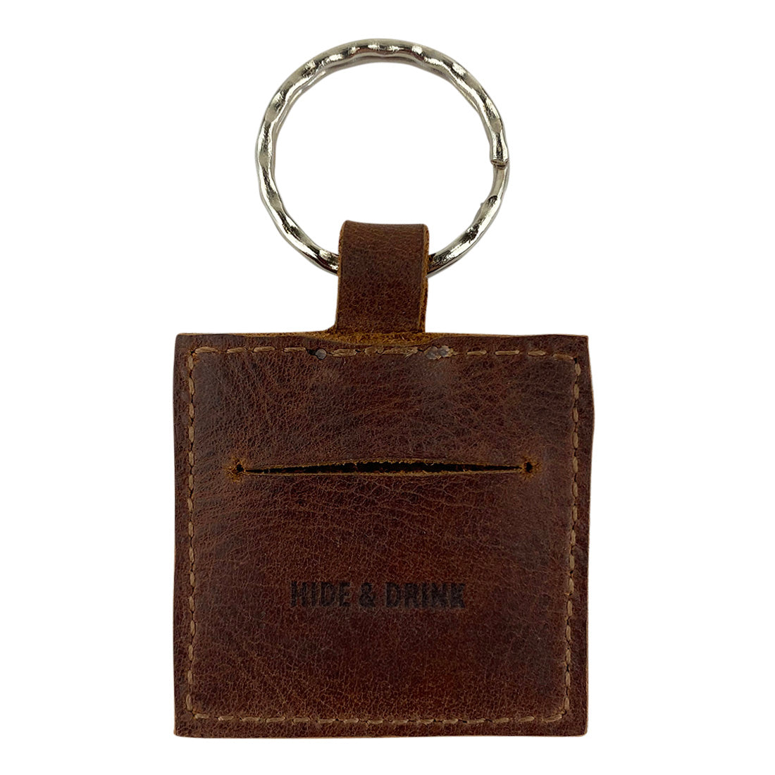 Reverse view of the AirTag Squared Keychain by Hide & Drink, featuring durable Full Grain Leather. This handmade keychain ensures your AirTag is secure. Squared AirTag Keychain, artisan made for easy storage and attachment, supporting small batch production.