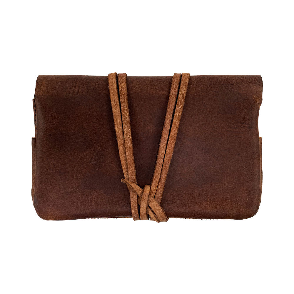 Stylish brown King Size Tobacco Pouch by Hide & Drink, expertly hand cut and hand sewn from durable Full Grain Leather. Ideal for storing tobacco and more, showcasing small batch production and handmade details from local artisans in Guatemala.