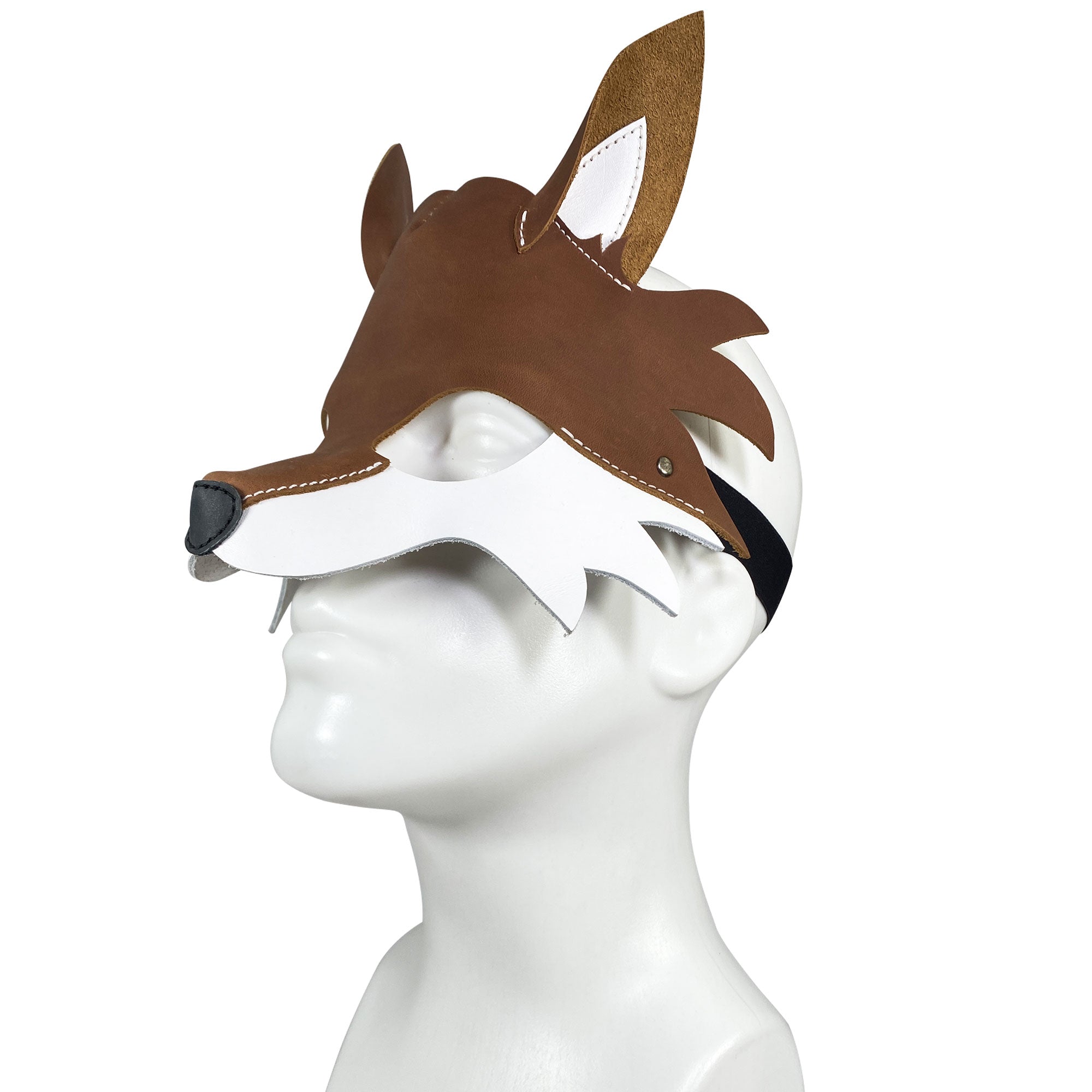 Side view of Fox Mask, illustrating its craftsmanship from full grain leather, ideal for Halloween and cosplay events. A unique piece by Hide & Play, combining artisan skill with small batch production in La Antigua Guatemala and Oaxaca Mexico.