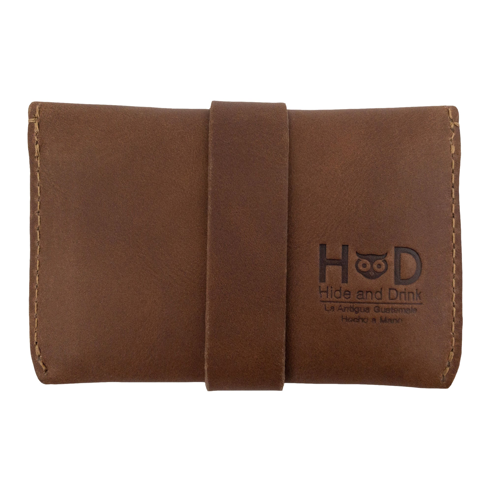 Back view of Hide & Drink's brown Credit Card Holder, highlighting the skill involved in its creation. This handmade full grain leather product embodies the ethos of small batch production from La Antigua Guatemala.