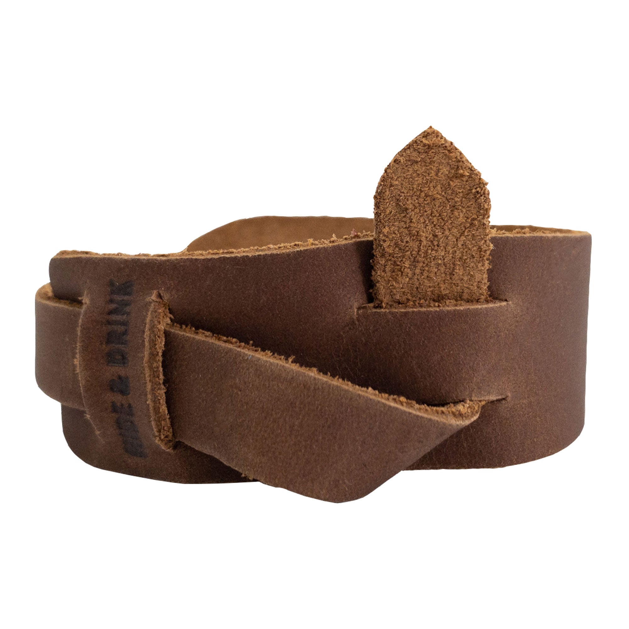 Side view of the light brown Hide & Drink Minimalist Wristband, showcasing its beautifully crafted adjustable strap. Made from full grain leather, this rustic bracelet is handmade by artisans in La Antigua Guatemala, emphasizing StockyardX's artisan craftsmanship.