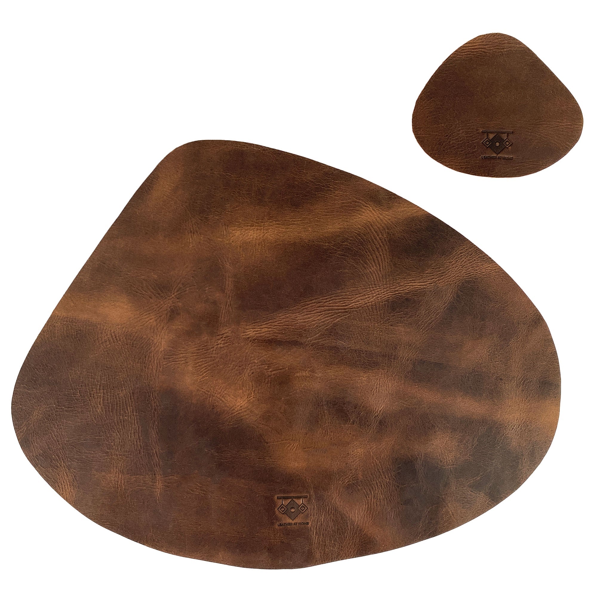 Stylish Leather Place Mats with Coasters Set of 4 by Leather At Home showcasing a sleek design and rustic charm. Each piece is handmade from full grain leather, making these decorative kitchen table mats a must-have home essential crafted in La Antigua Guatemala & Oaxaca Mexico.