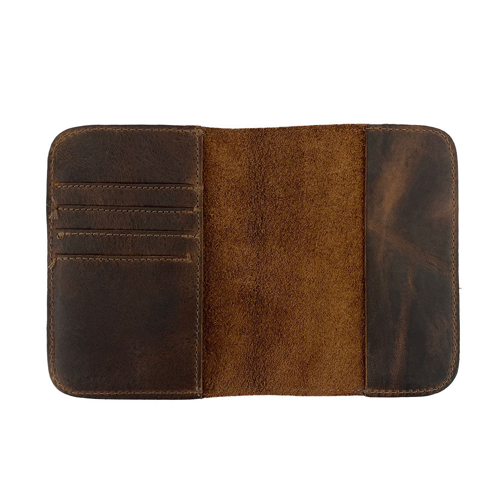 Full view of the Hide & Drink Travel Wallet displaying its stunning finish. This travel wallet serves as an essential bifold passport case and money holder, handcrafted with care in La Antigua Guatemala.