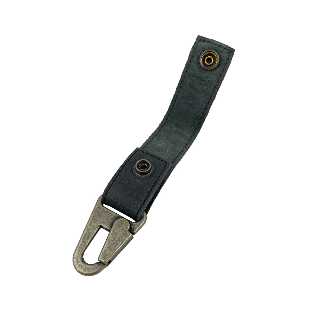 Key Ring Holder by Hide & Drink, showcasing a rustic design made from Full Grain Leather. Perfect for keeping your keys organized. Features include artisan craftsmanship, handmade in La Antigua Guatemala & Oaxaca Mexico, and a durable metal snap clip.