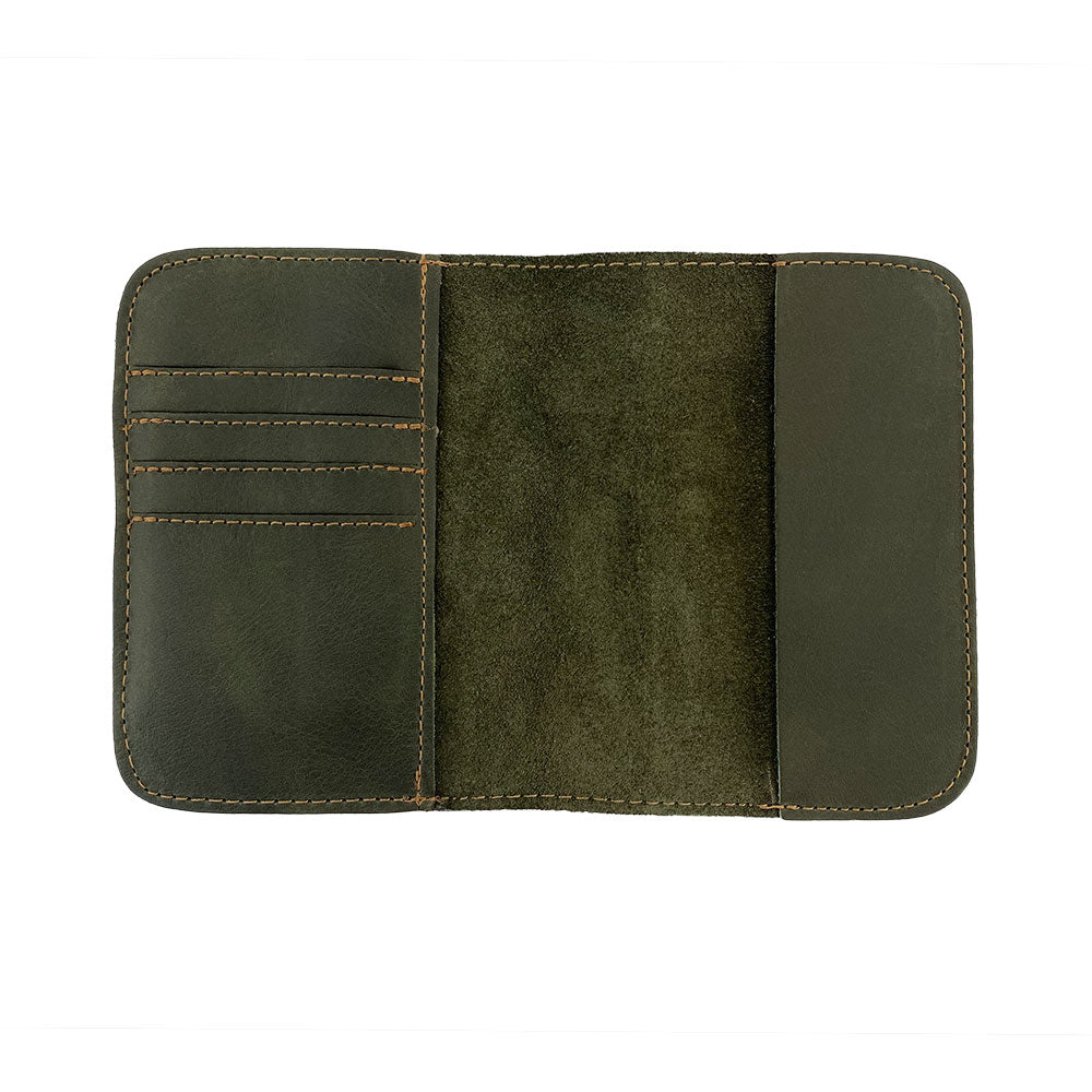 Detailed view of the Hide & Drink Travel Wallet showcasing its features. This travel wallet is an exquisite bifold passport case, designed from premium leather in La Antigua Guatemala.