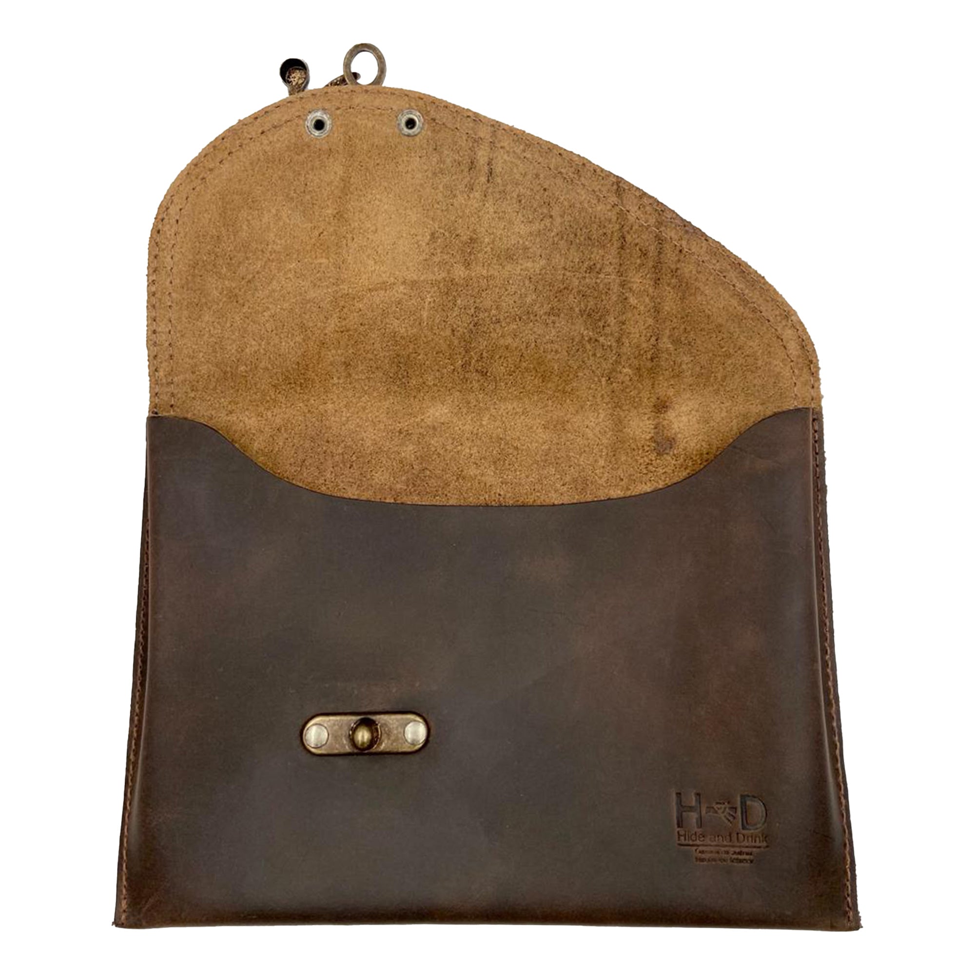Inside view of the Petite Vintage Clutch Bag by Hide & Drink, highlighting its soft raw leather interior. This vintage handbag is ideal for keeping essentials organized while showcasing the beauty of full grain leather, crafted in small batches by artisans.
