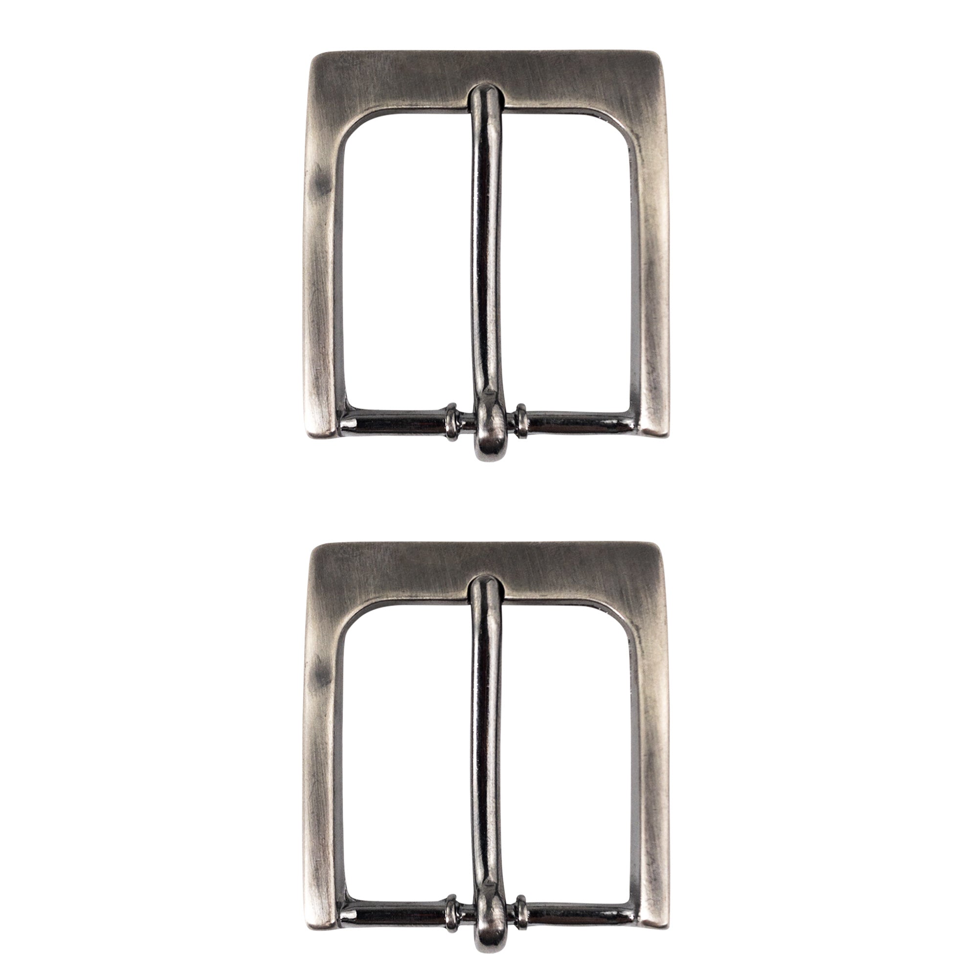 A close-up of two 1.5 Inch Single Prong Buckle Replacements from Leather Handcraft Supply Depot. These buckles feature a rustic look, perfect for giving your boring belt or dog collar a stylish makeover. Hide & Drink’s buckles, rivets, D-Rings and other metal hardware are bringing the old style back again, making them suitable for any outfit.