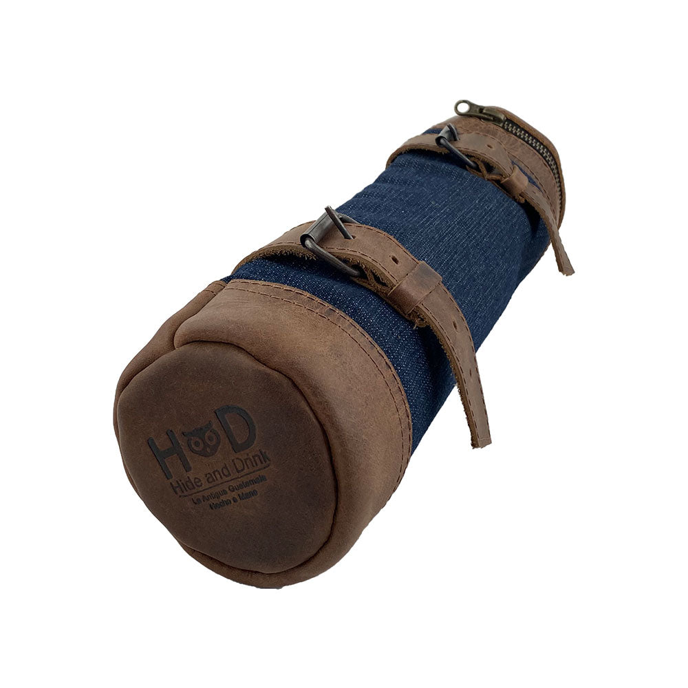 Bicycle equipped with the Navy Blue Bicycle Tube from Hide & Drink, illustrating its practical use for carrying drinks. This Zipper Commute Bag combines style with artisan craftsmanship and is perfect for riders who value quality. Handmade in La Antigua Guatemala and Oaxaca Mexico.