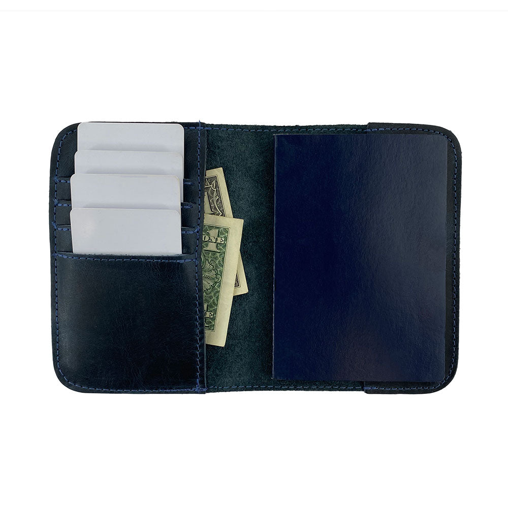 Sleek profile of the Hide & Drink Travel Wallet, showcasing its simple elegance. This travel wallet is made as a bifold passport case, carefully handcrafted from premium leather in La Antigua Guatemala.