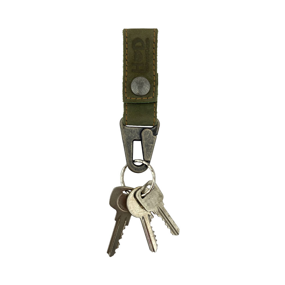 Hide & Drink Key Ring Holder featuring multiple keys, demonstrating its practicality and design. Handcrafted from Full Grain Leather, this artisan product showcases Small Batch Production, emphasizing Hand Cut and Hand Sewn craftsmanship.