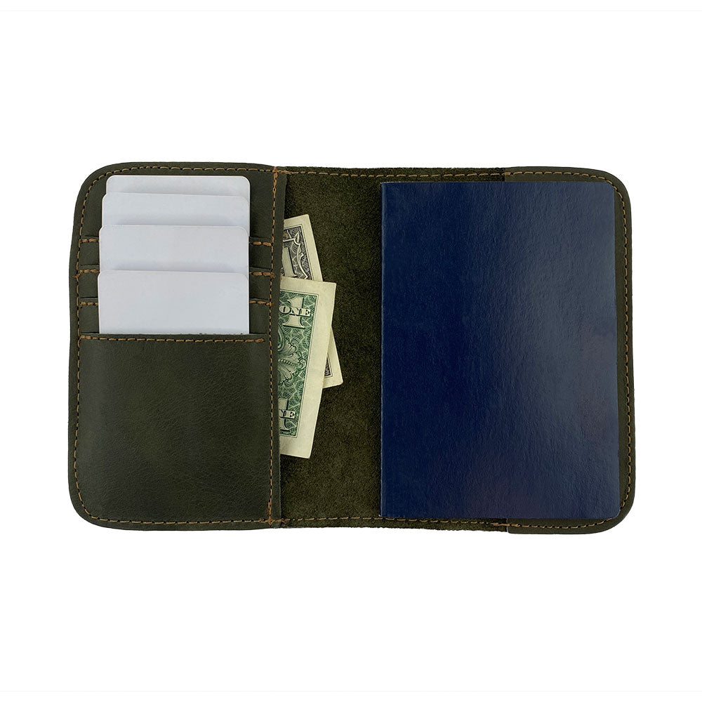 Open interior view of the Hide & Drink Travel Wallet revealing card slots and cash sections. This travel wallet serves as a functional bifold passport case, artisan-crafted in La Antigua Guatemala.