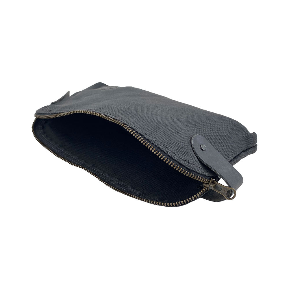 Dopp Kit Utility Bag by Hide & Drink showcasing a stylish and functional design perfect for various uses. This large rustic all-purpose Dopp Kit Utility Bag is crafted from full grain leather emphasizing hand cut and hand sewn techniques, handmade in La Antigua Guatemala & Oaxaca Mexico.