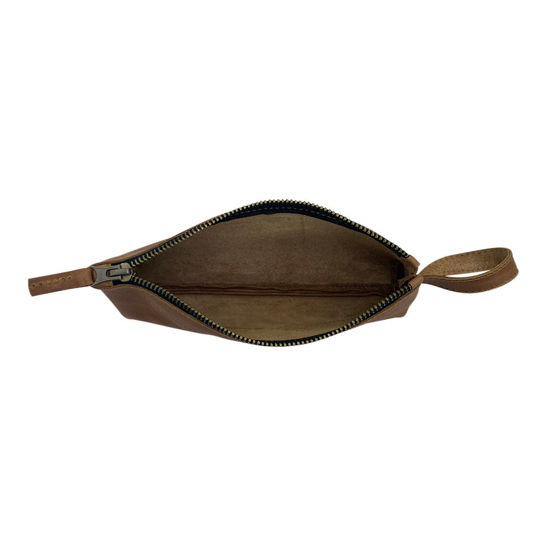 Hide & Drink's X Stitched Case, demonstrating versatility for toiletries and writing instruments, features a durable zipper closure. Made by skilled artisans in La Antigua Guatemala and Oaxaca, Mexico, this full grain leather piece embodies quality and craftsmanship.