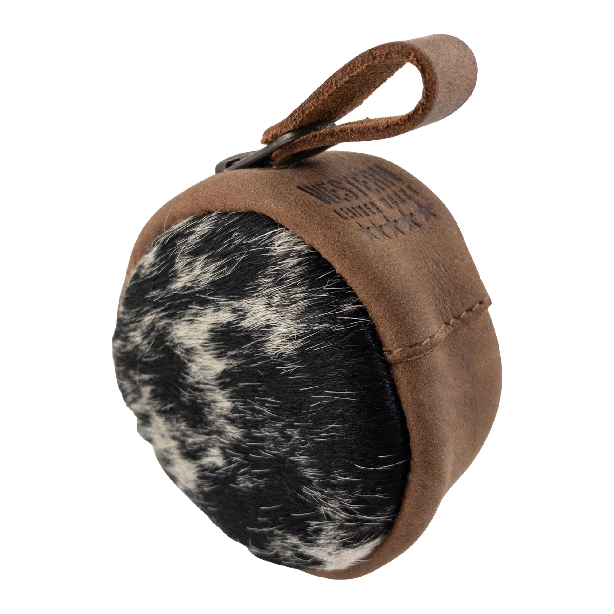 The back of the Rounded Coin Case by Western Leather Works features its unique leather construction and artisanal branding. Ideal for various small items, this handy accessory is both stylish and functional. Each coin case is lovingly crafted in La Antigua Guatemala, ensuring high standards of quality in every hand cut and sewn piece.