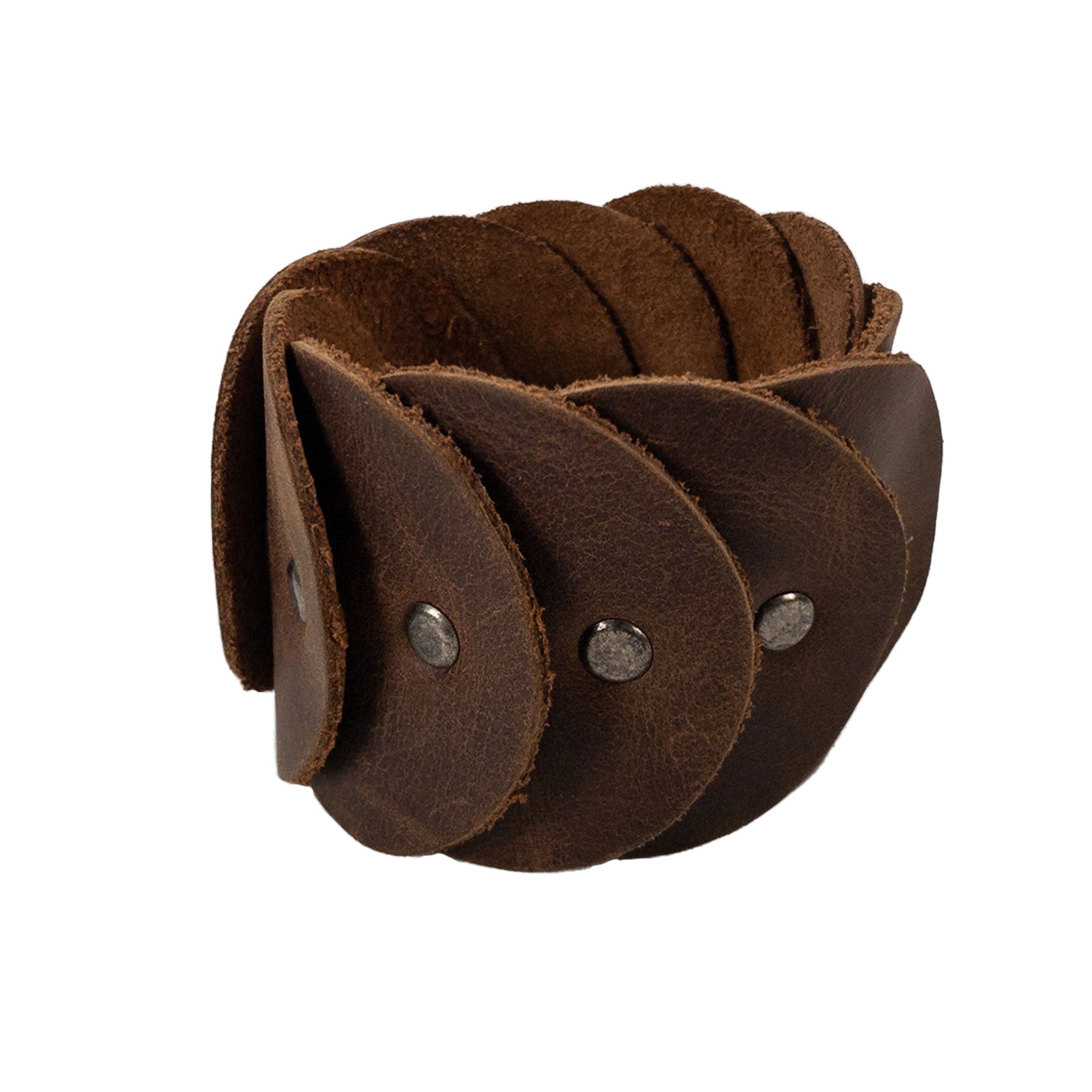The Moon Bracelet by Heather's, featuring a distinct layered design crafted from Full Grain Leather. This handmade piece reflects the principles of Small Batch Production, including thoughtful Hand Cut and Hand Sewn details. It is Fire Branded to celebrate the artisanal heritage from La Antigua Guatemala & Oaxaca Mexico.