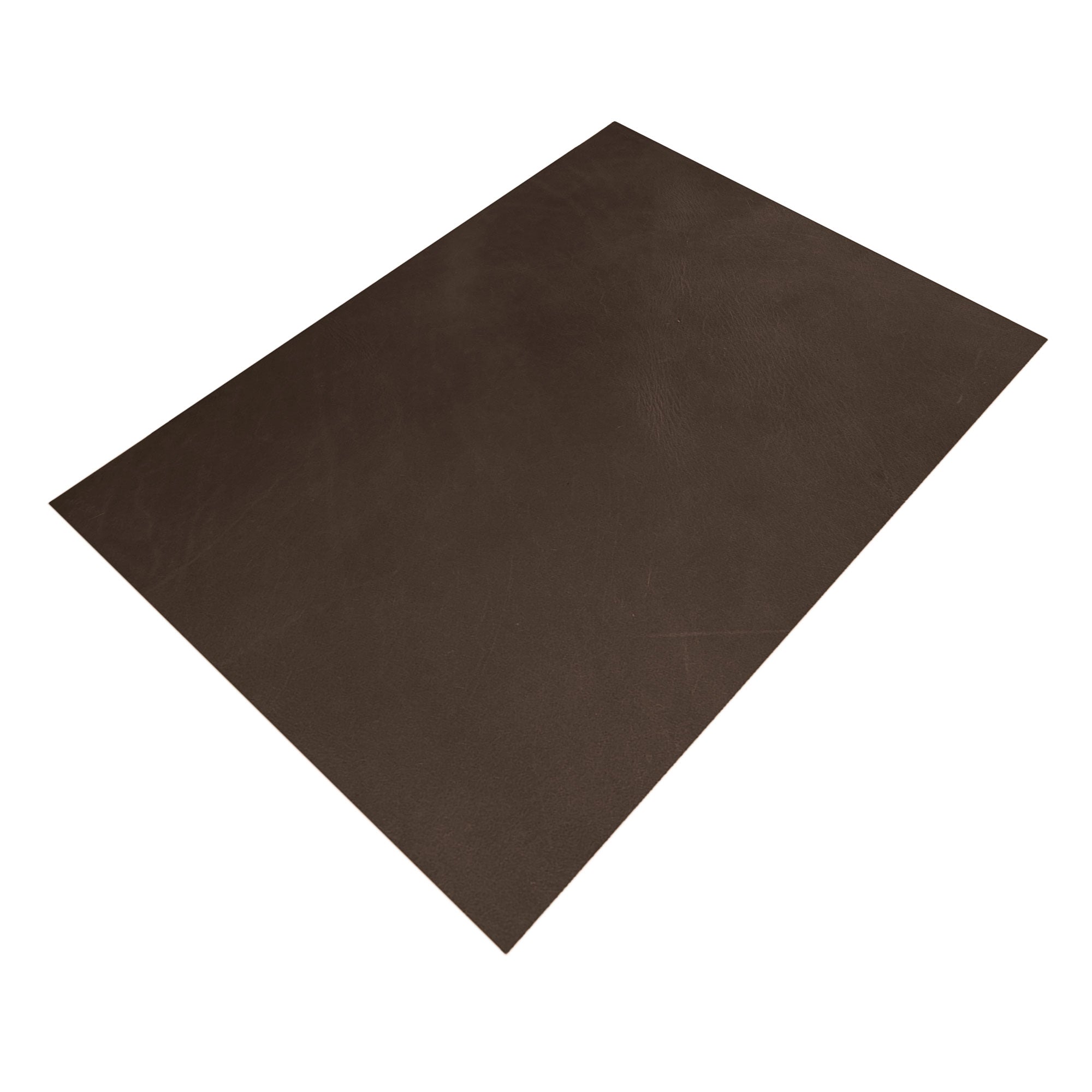 A beautifully textured dark brown Leather Rectangle 8 x 11 in. from Thick Full Grain Leather (2.6 to 2.8mm) by Leather Handcraft Supply Depot ideal for crafting. This Full Grain Leather Rectangle (8 X 11 in.) from Thick Full Grain Leather (2.6 to 2.8mm) is designed for hobby workshops, artisan goods, small batch production, and hand sewn items handcrafted in La Antigua Guatemala & Oaxaca Mexico.