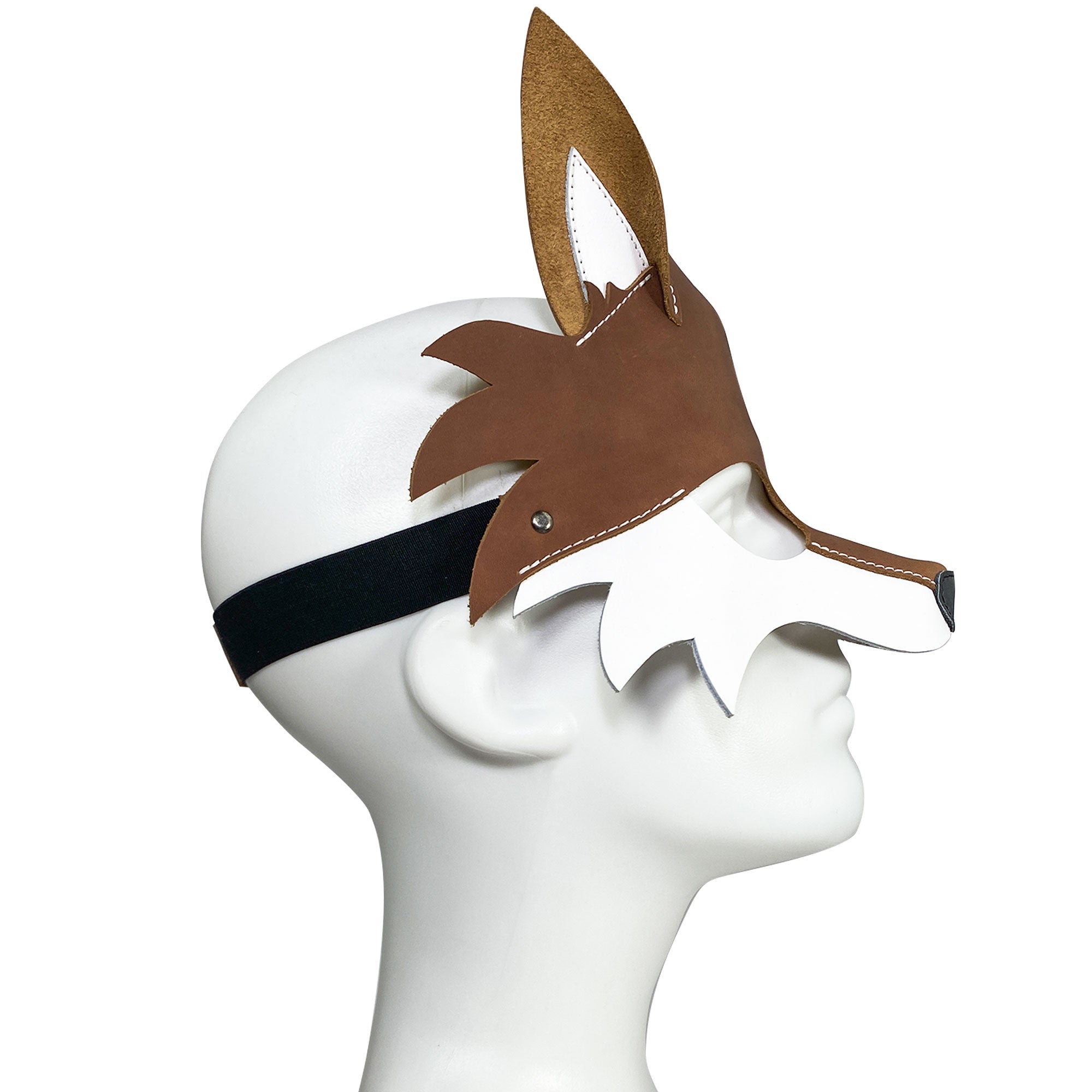 Profile view of Fox Mask, showcasing its unique design made from full grain leather. Ideal for performances and cosplay by Hide & Play, known for their handmade, small batch production in La Antigua Guatemala and Oaxaca Mexico.