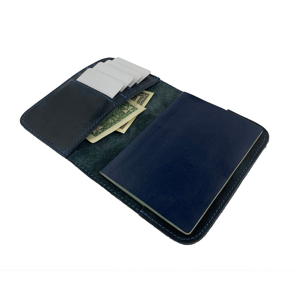 Inside layout of the Hide & Drink Travel Wallet with detailed view of pockets for cards and cash. This travel wallet serves as a multifunctional bifold passport case, artisan-crafted in La Antigua Guatemala.