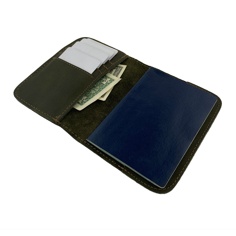 Sleek view of the Hide & Drink Travel Wallet demonstrating its practicality. This stylish travel wallet functions as a bifold passport case made from full grain leather in La Antigua Guatemala.