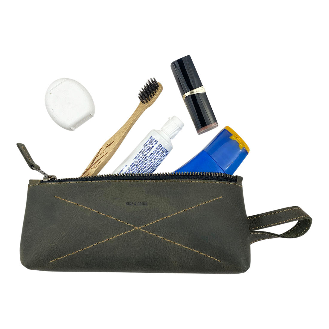 Hide & Drink's X Stitched Case, ideal for keeping your writing instruments organized, emphasizes hand stitching and durable materials. A true travel essential, made with love by artisans in La Antigua Guatemala and Oaxaca, Mexico.