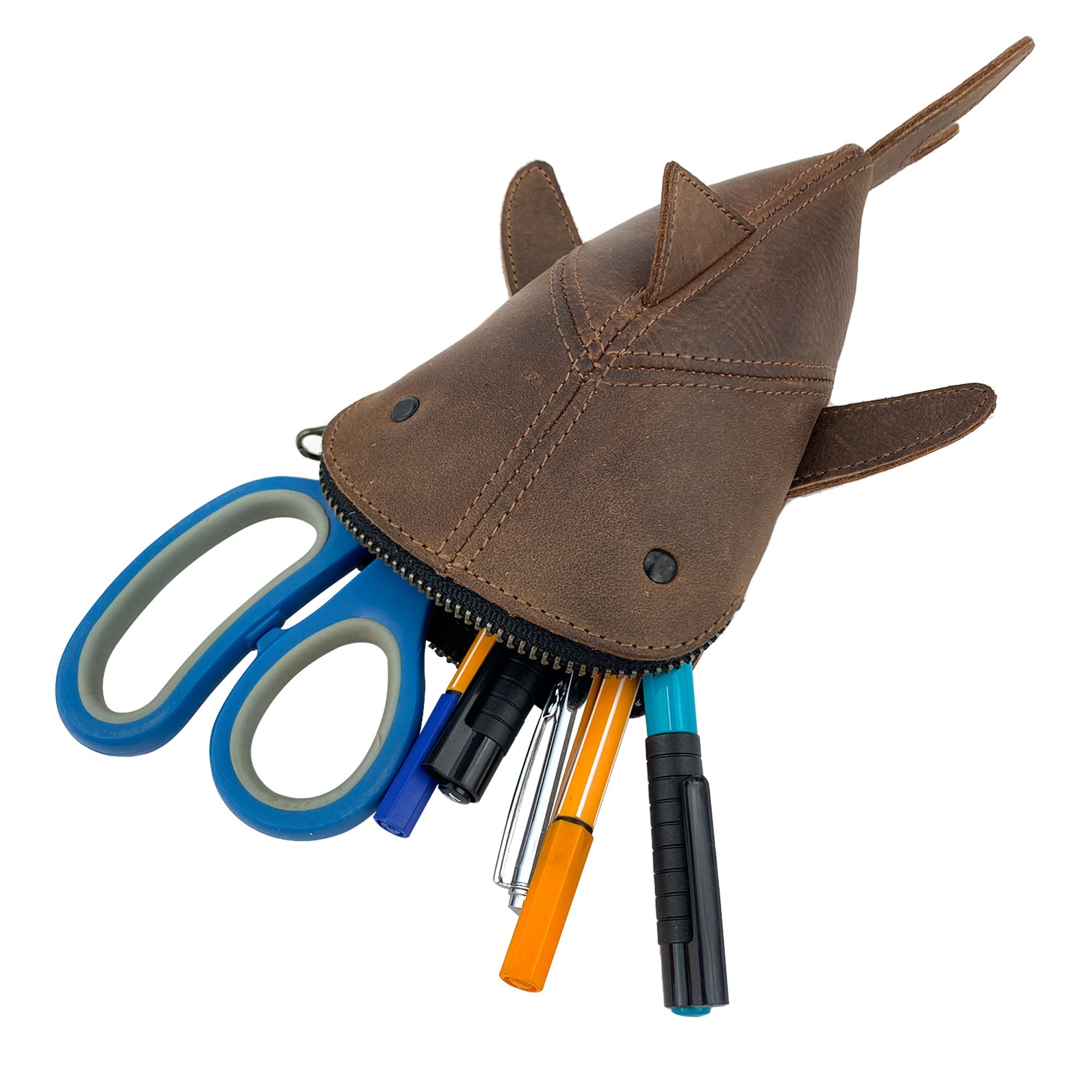 Dimensions of the brown Leather Shark Pouch by Hide & Drink, emphasizing its compact size and shape. This zippered case is perfect for coins or cables, functioning well as a shark shaped pencil purse. It is crafted from full grain leather, showcasing artisan skill from La Antigua Guatemala & Oaxaca Mexico.