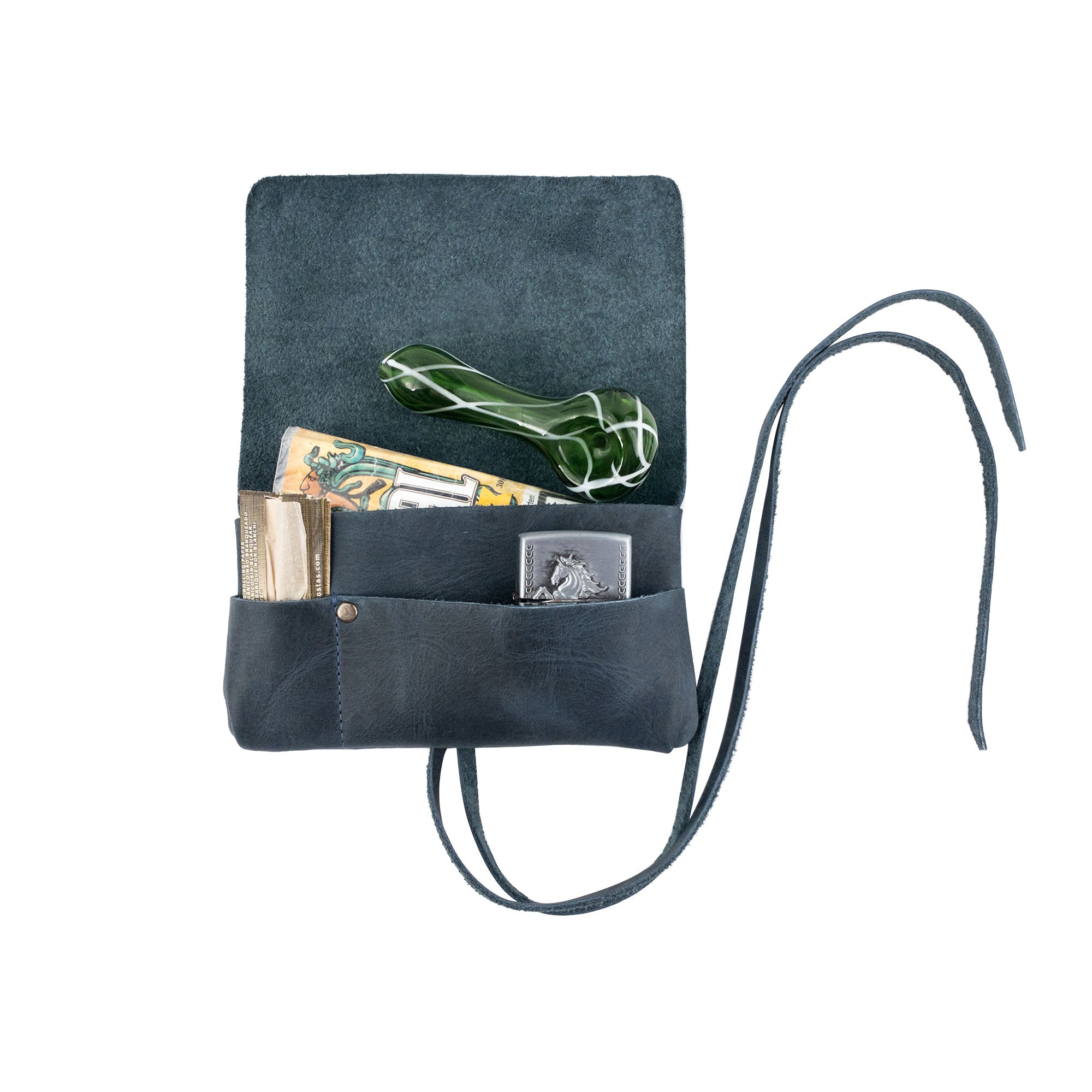 Hide & Drink's King Size Tobacco Pouch filled with accessories; a stylish yet practical solution for tobacco storage made from luxurious full grain leather, hand sewn by artisans in La Antigua Guatemala.