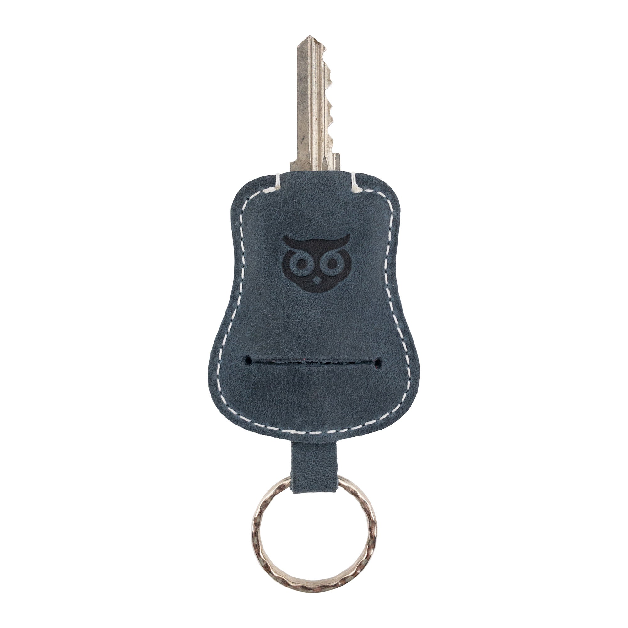 Guitar Keychain by Hide & Drink displaying its versatility and design, perfect for everyday key carrying. Handmade from durable Full Grain Leather, this keyring exemplifies artisan craftsmanship from small batch production in La Antigua Guatemala & Oaxaca Mexico.