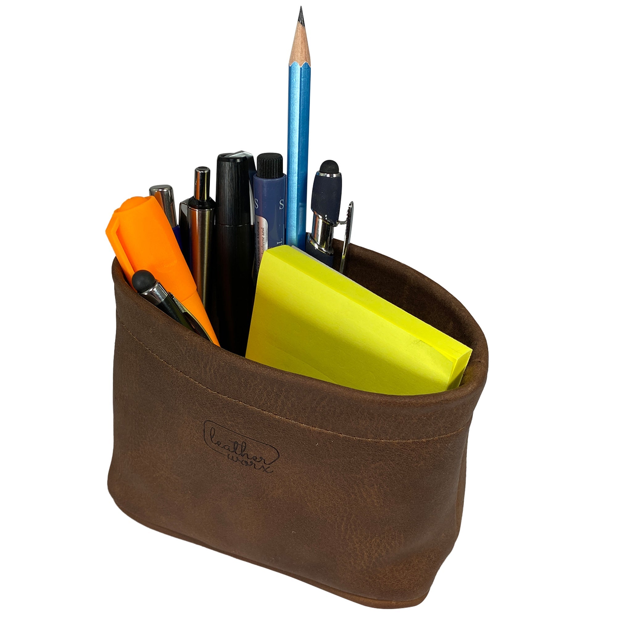 The Leather Worx Desk Organizer Bag elegantly displaying essential office supplies with a touch of artisan style. This functional Desk Organizer Bag, crafted from full grain leather, emphasizes hand sewn and fire branded quality, made with pride in small batches in La Antigua Guatemala & Oaxaca Mexico.