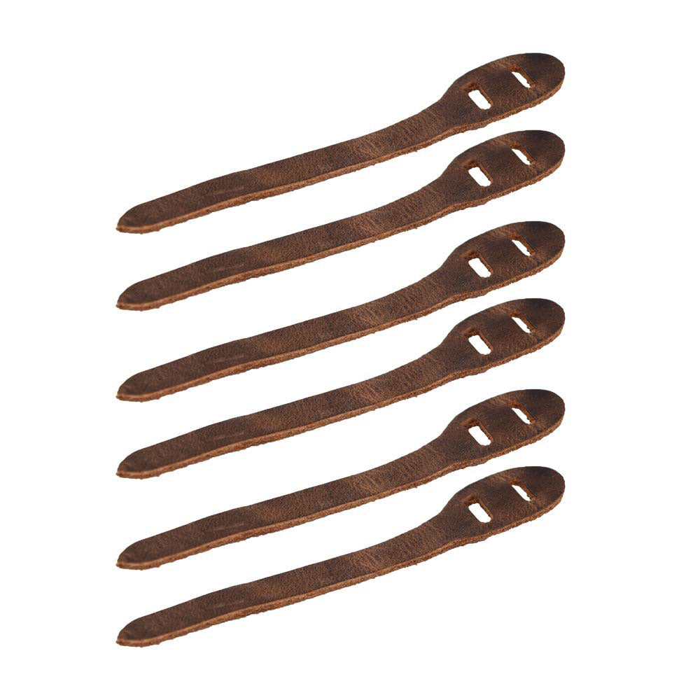 Set of 6 Rustic Zipper Pulls Replacement by Hide & Drink, ideal for backpacks, jackets, wallets, luggage, and bags. Crafted from full grain leather, this handmade product showcases small batch production techniques. Each zipper pull is hand cut and sewn, fire branded, and artisan-made in La Antigua Guatemala & Oaxaca Mexico. Perfect for adding a touch of rustic charm to your items.