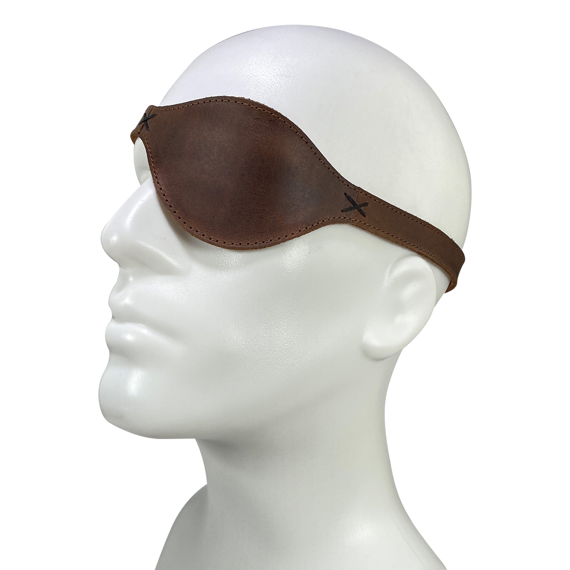 Pirate Eye Patch by Hide & Play, showcasing a comfortable fit made from full grain leather, ideal for your next cosplay, Halloween event, or live performance. This artisan product is part of the StockyardX collection, hand cut and hand sewn in La Antigua Guatemala.