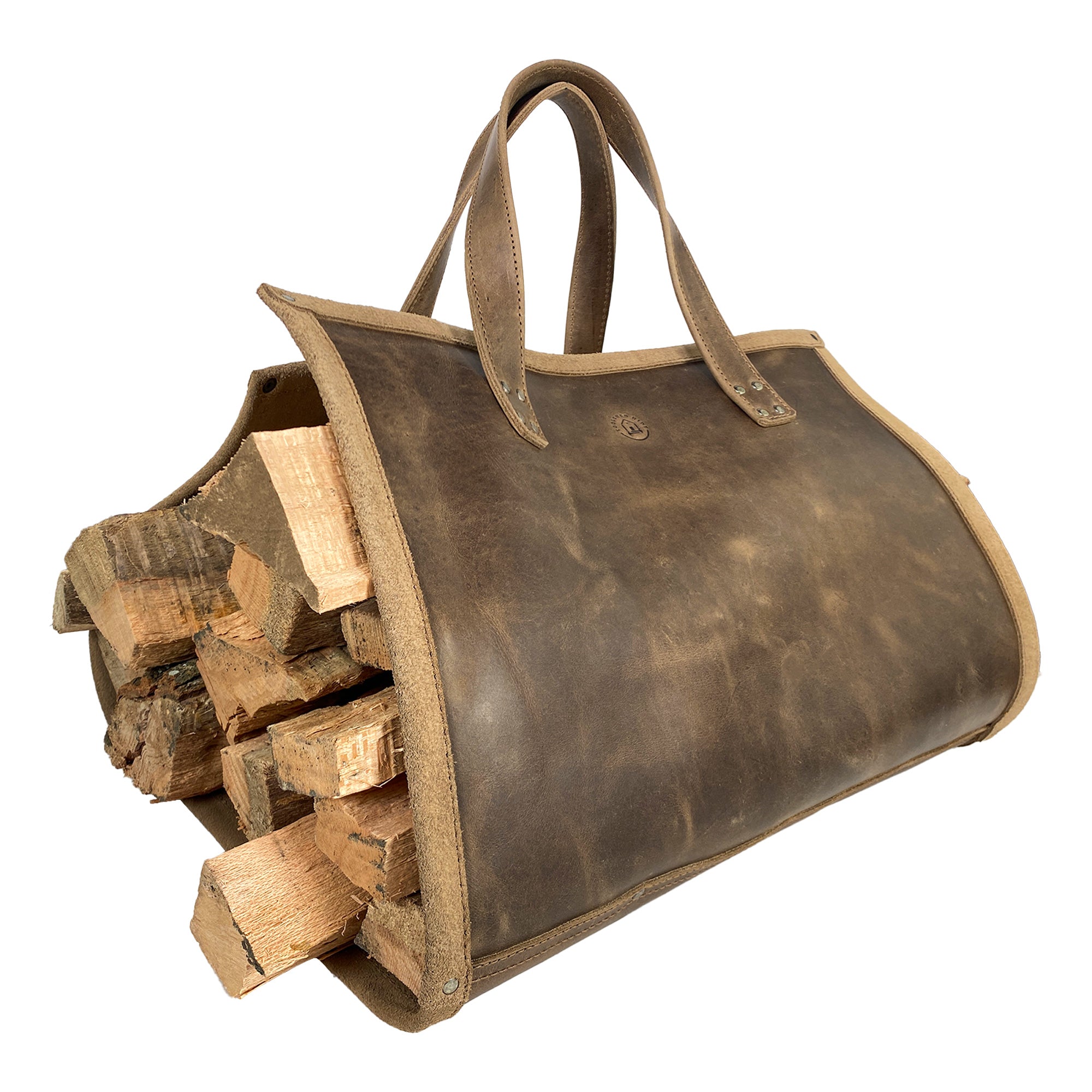 Rustic Firewood Carrier with Handles from Toolshed Hide, featuring a foldable log bag design made from Full Grain Leather, perfect fireplace wood stove accessories. This handmade, artisan product showcases small batch production, hand cut and hand sewn craftsmanship, fire branded in La Antigua Guatemala & Oaxaca Mexico.