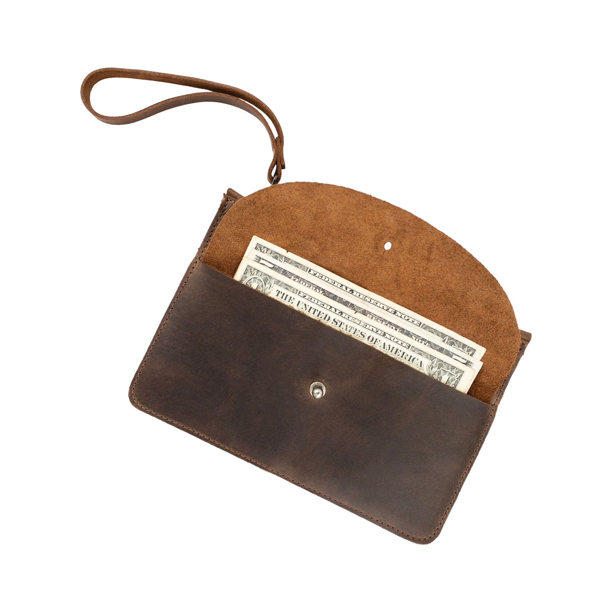 Inside view of Heather's Clutch Bag with Extra Pouch displaying space for cash and cards. This Full Grain Leather wrist wallet for cards embodies the great craftsmanship and artisan touch of Heather's, handmade in La Antigua Guatemala & Oaxaca Mexico.